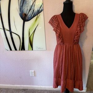Holding horses dress size XS